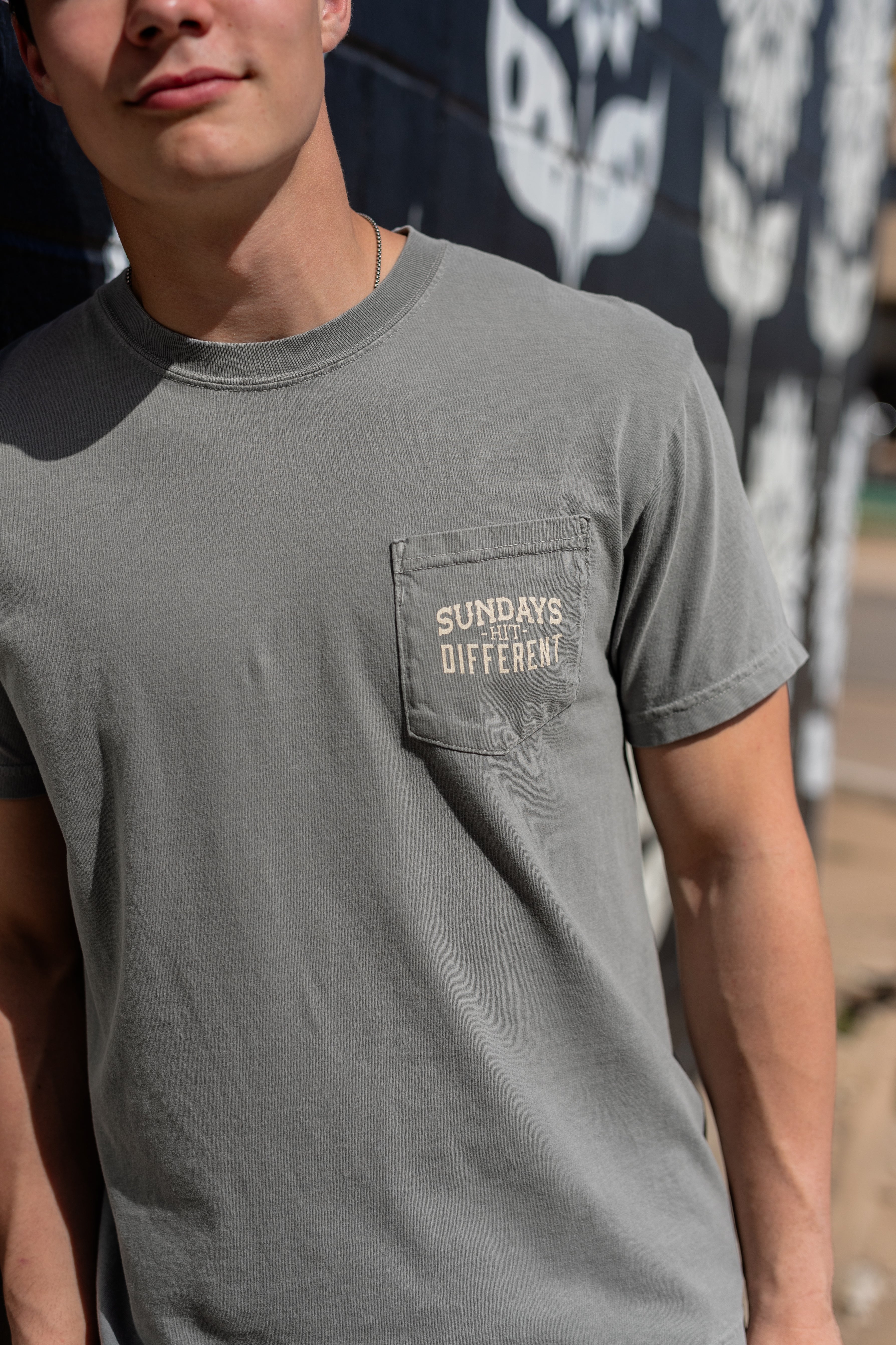 Sundays Hit Different Pocket Tee