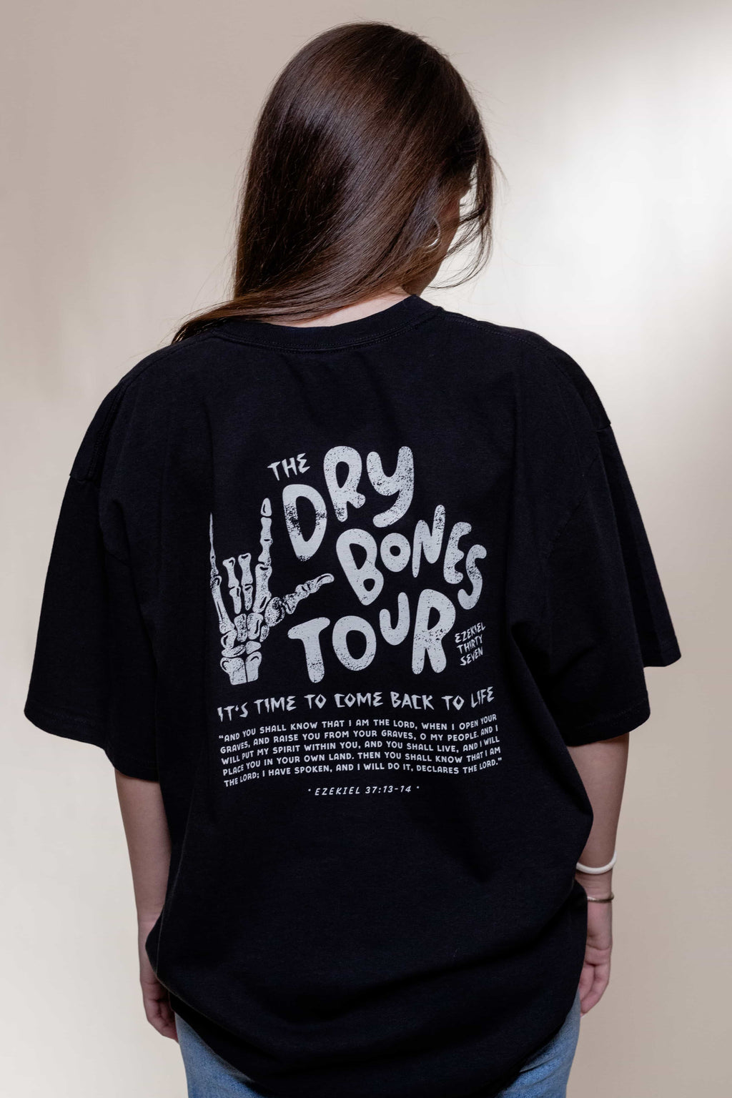 T-shirt from Faith based Christian company, Christian Shirts Shop. 
Graphic: Dry Bones Tour Ezekiel 37:13-14
Color: Black
Brand: Comfort Colors