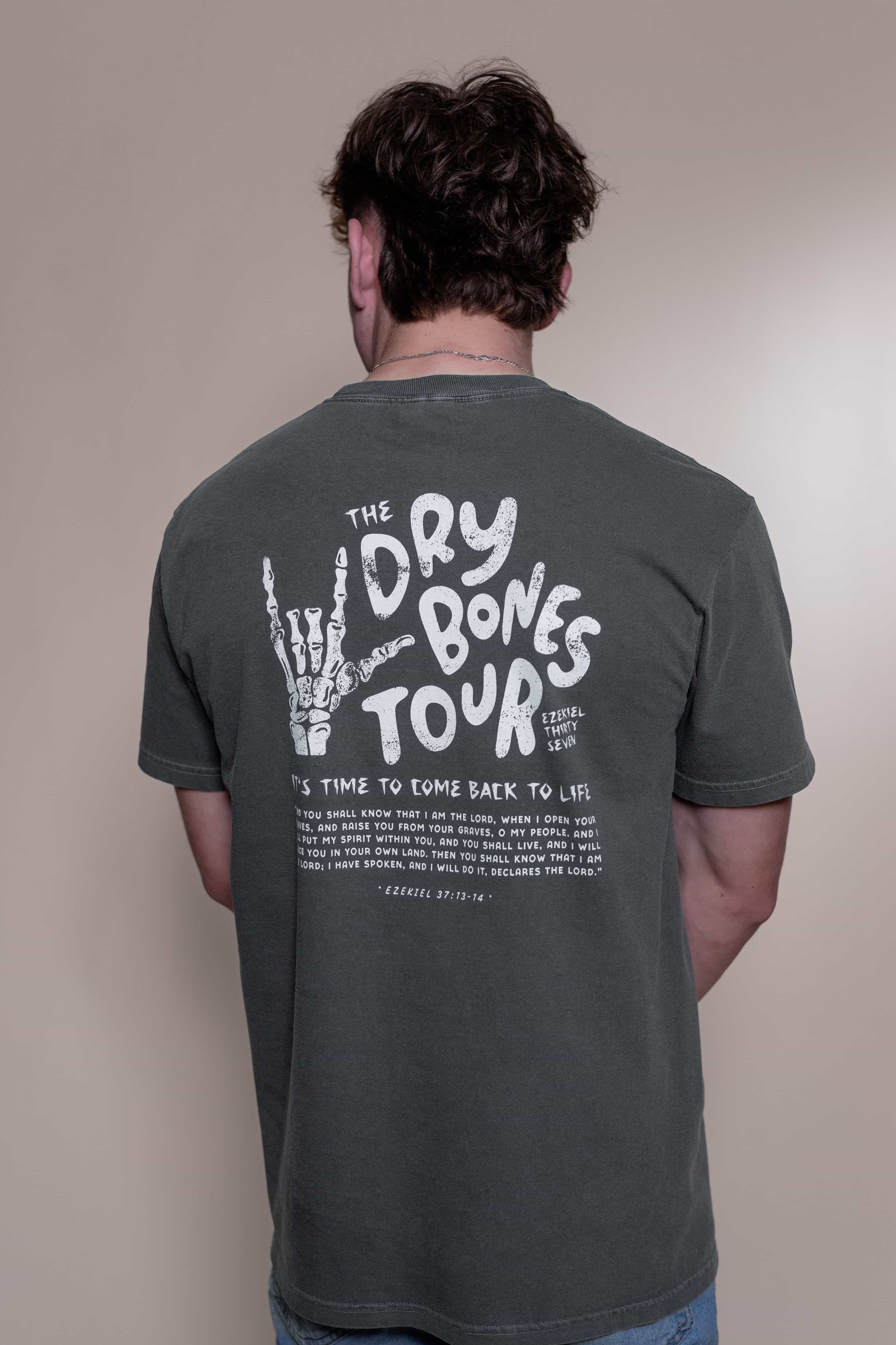 T-shirt from Faith based Christian company, Christian Shirts Shop. 
Graphic: Dry Bones Tour Ezekiel 37:13-14
Color: Graphite
Brand: Comfort Colors