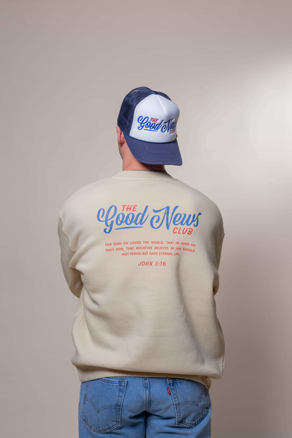 Sweatshirt from Faith based Christian company, Christian Shirts Shop. 
Graphic: The Good News Club John 3:16
Color: Cream Sweatshirt with red and blue graphics
Brand: Lane Seven