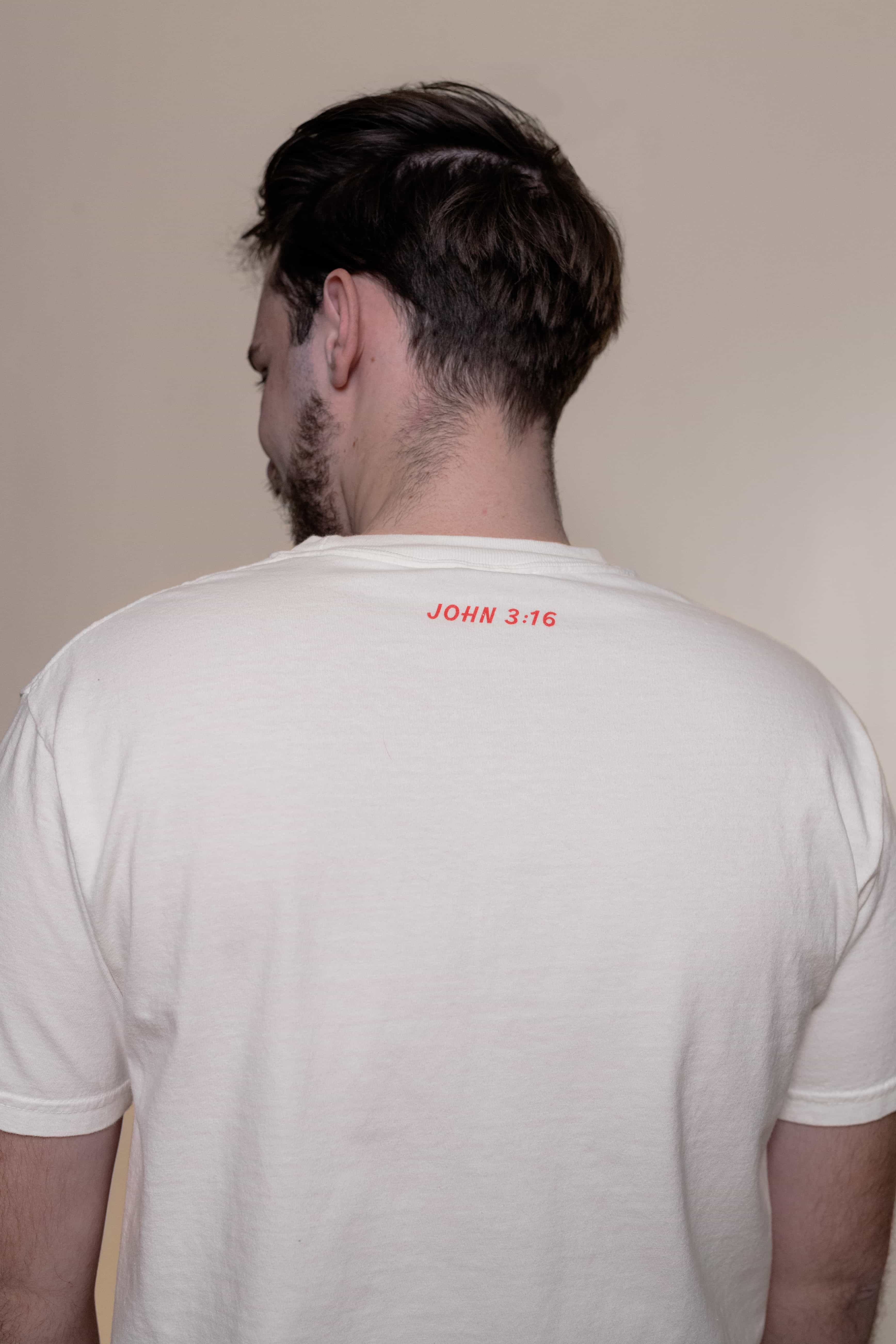 T-shirt from Faith based Christian company, Christian Shirts Shop. 
Graphic: The Good News Club John 3:16
Color: White shirt with red and blue graphics
Brand: Comfort Colors