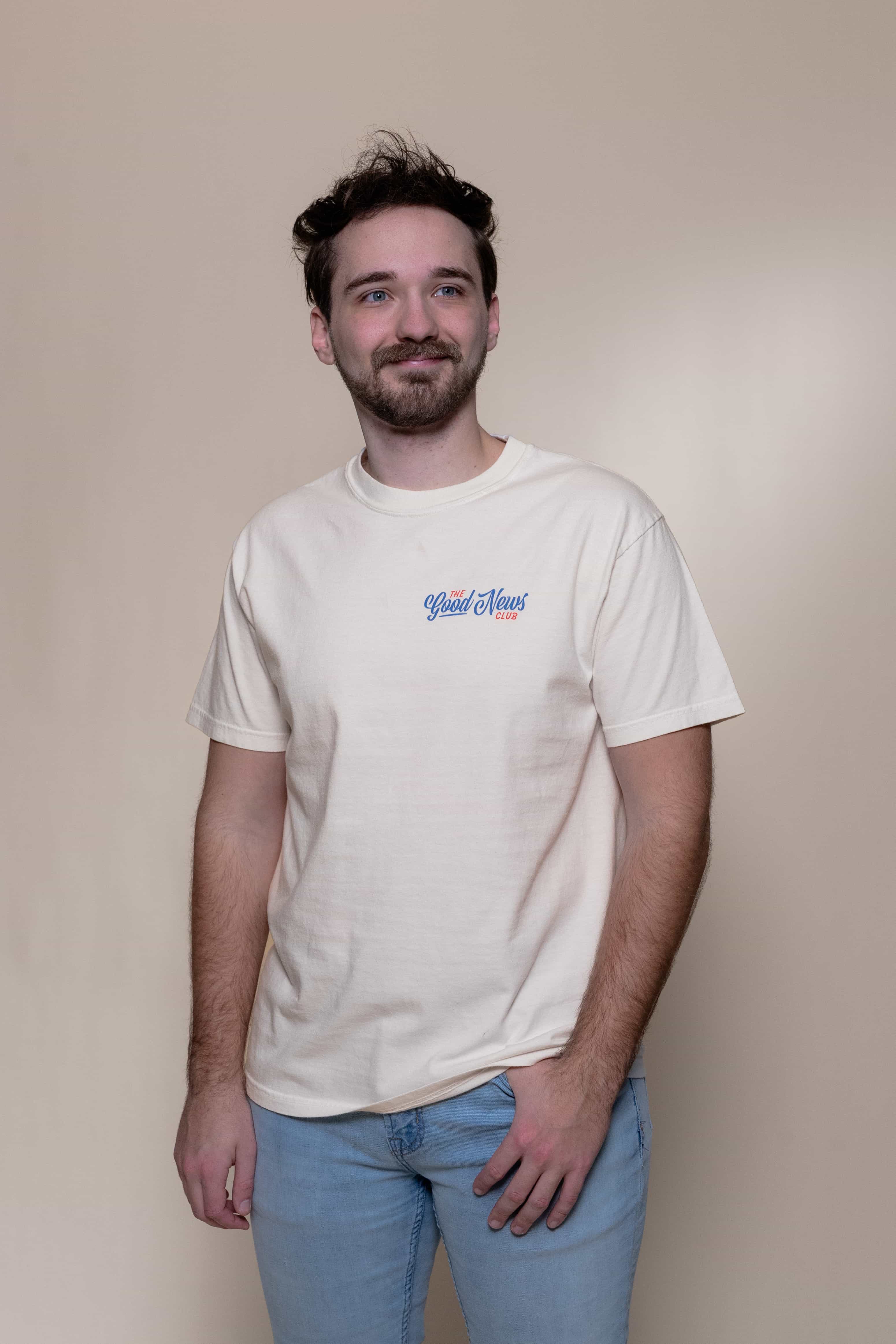 T-shirt from Faith based Christian company, Christian Shirts Shop. 
Graphic: The Good News Club John 3:16
Color: White shirt with red and blue graphics
Brand: Comfort Colors