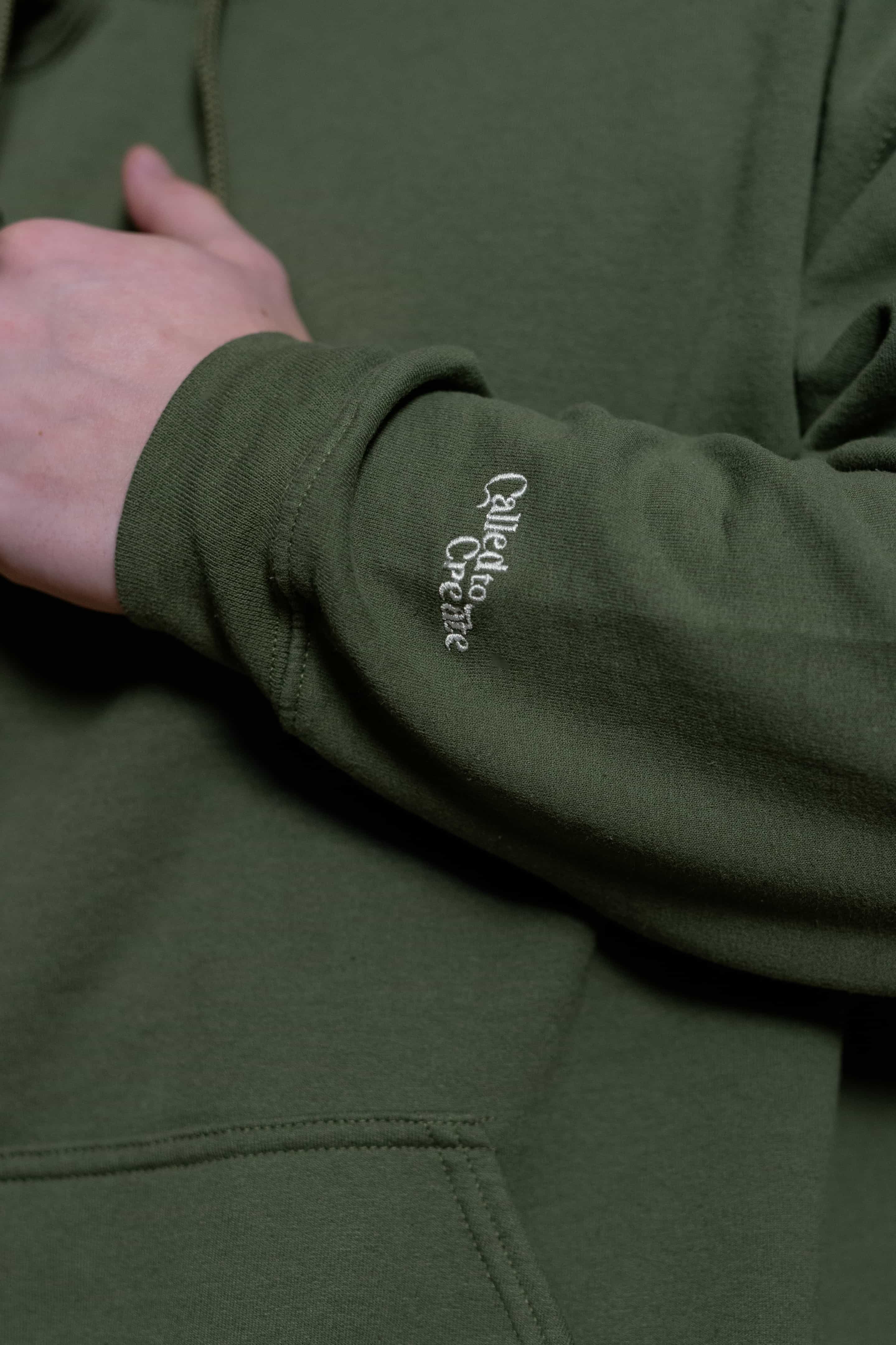 Hooded Sweatshirt from Faith based Christian company, Christian Shirts Shop. 
Graphic: Created in His Image & Glory
Color: Military Green
Brand: Comfort Colors