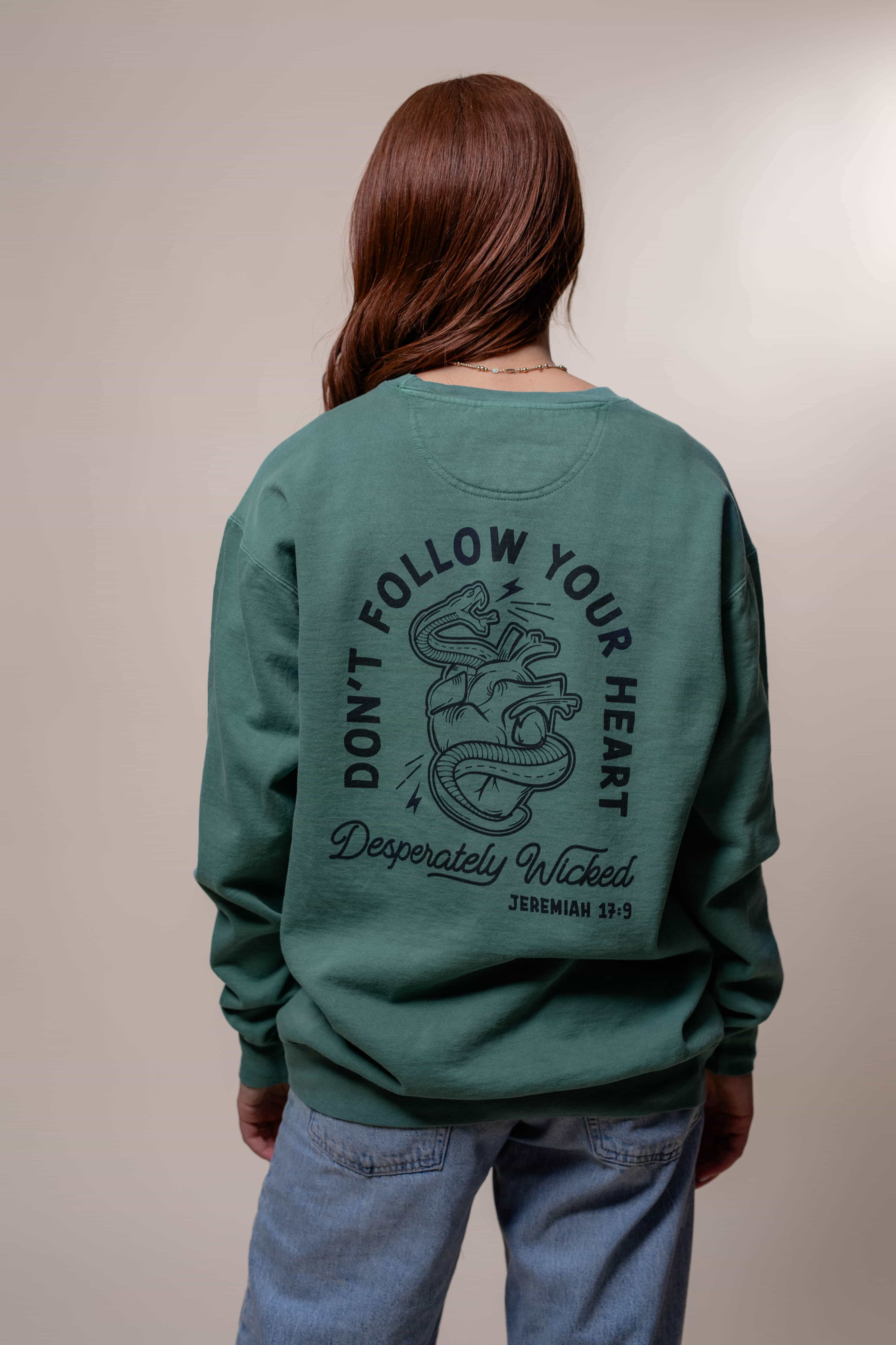 Religious Sweatshirt from Faith based Christian company, Christian Shirts Shop.
Graphic: Wicked Heart Jeremiah 17:9
Color: light green
Brand: Comfort Colors